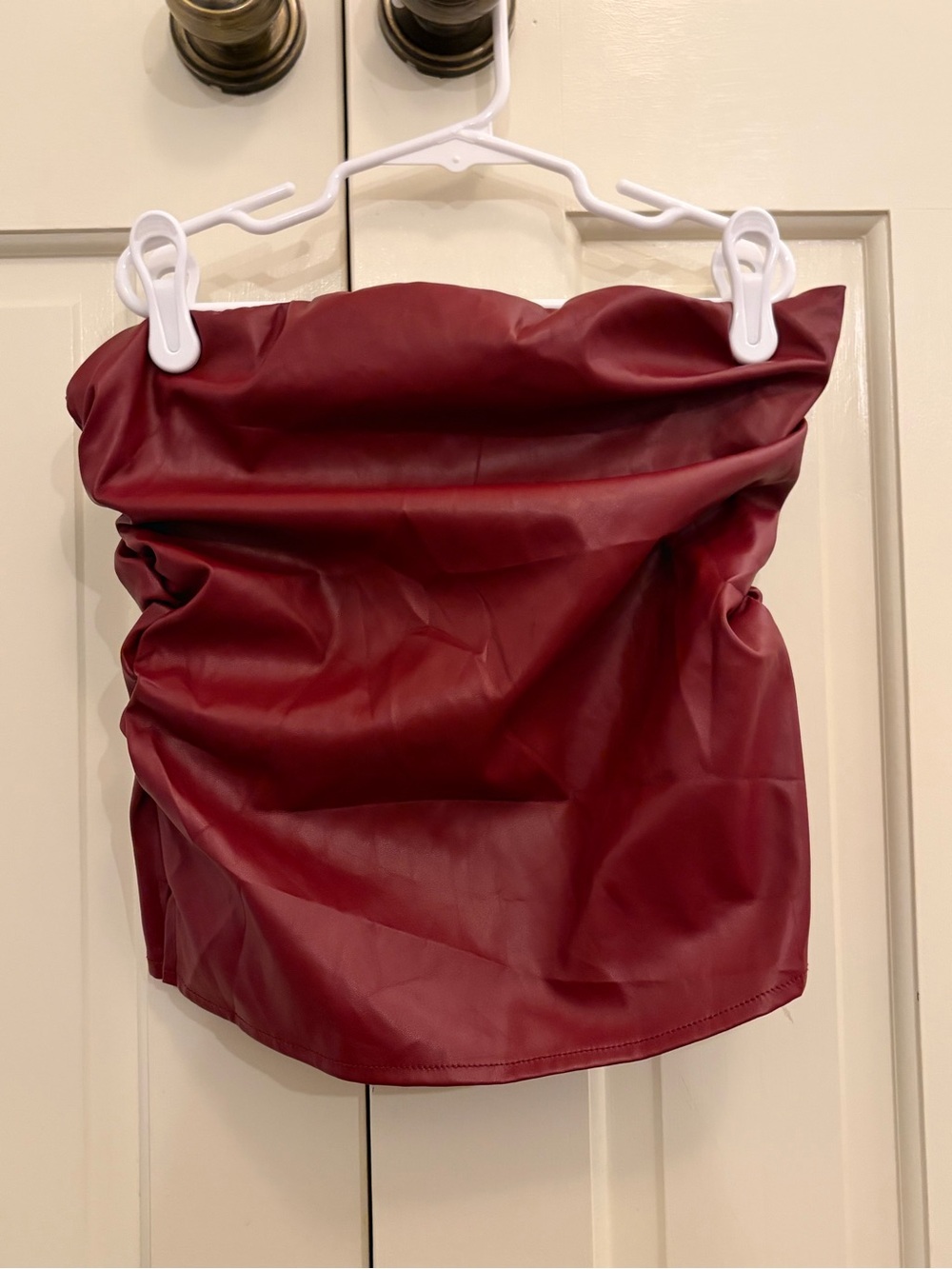 Faux leather going out top